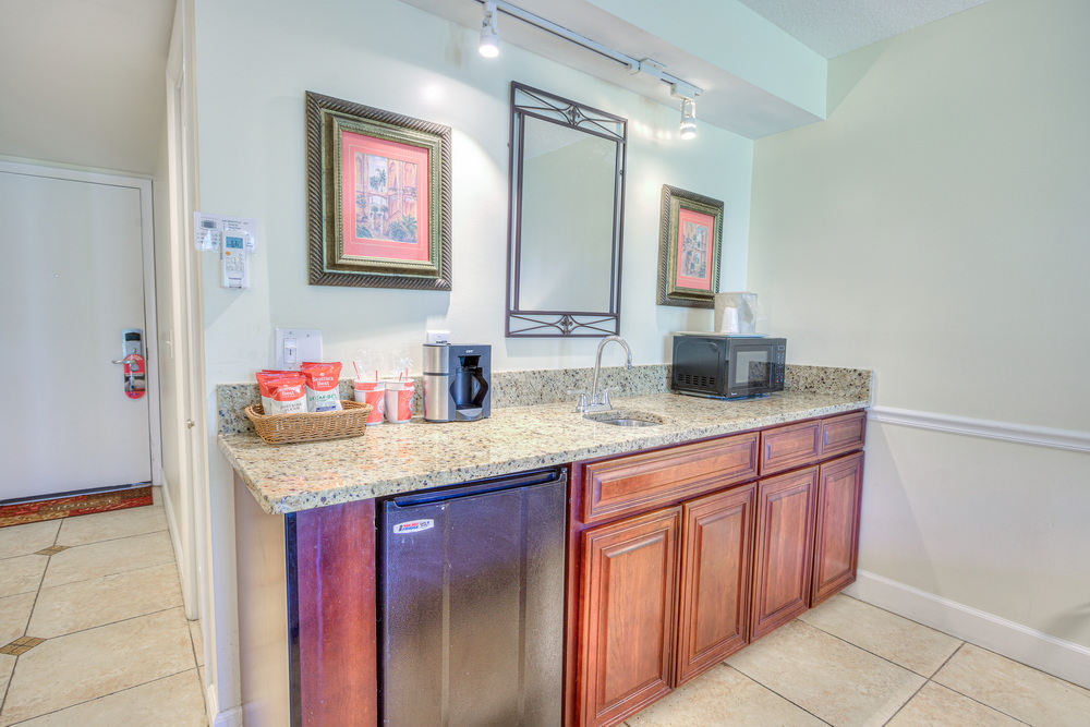 Granite wet bar in the living area